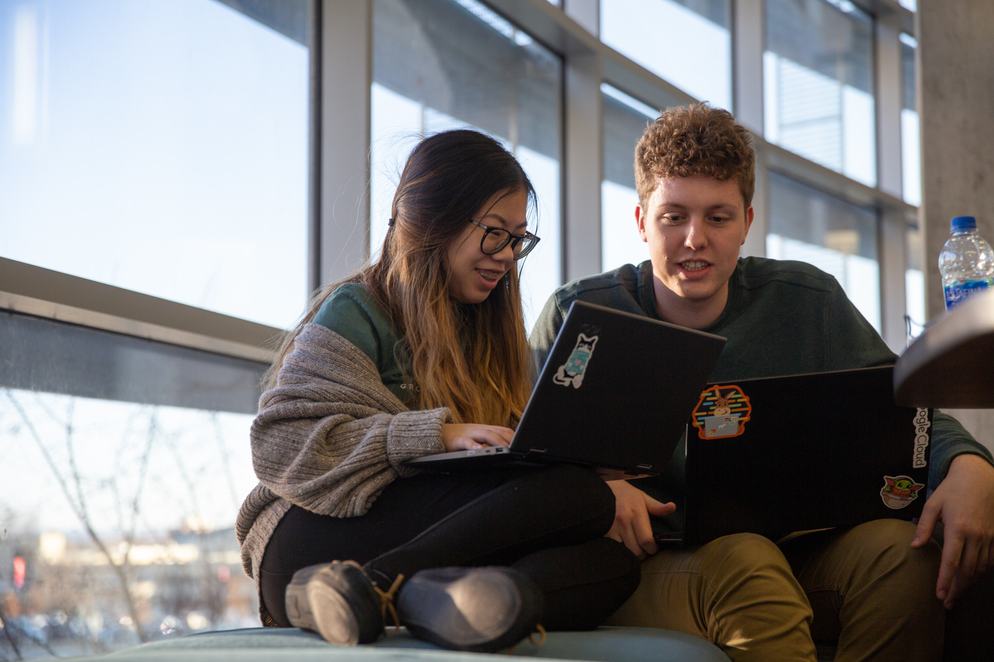 two engineering students studying together