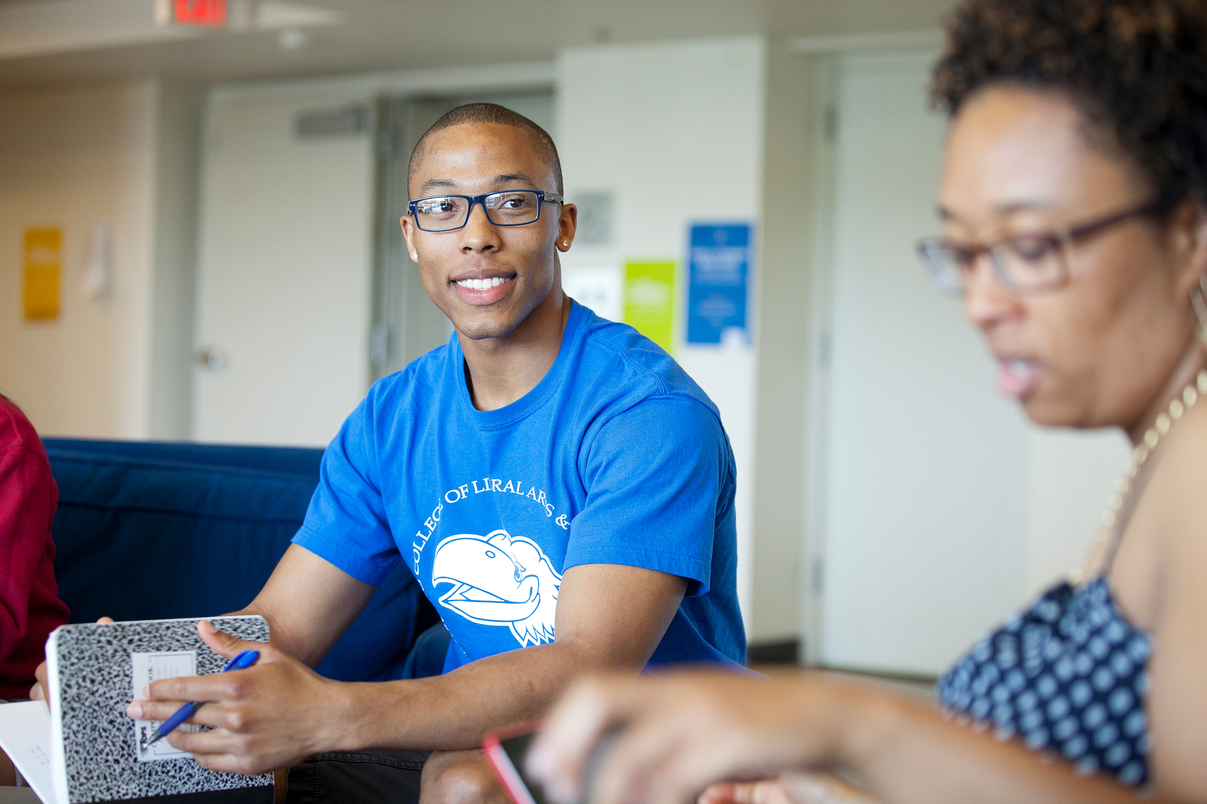 students hanging out in a floor lobby