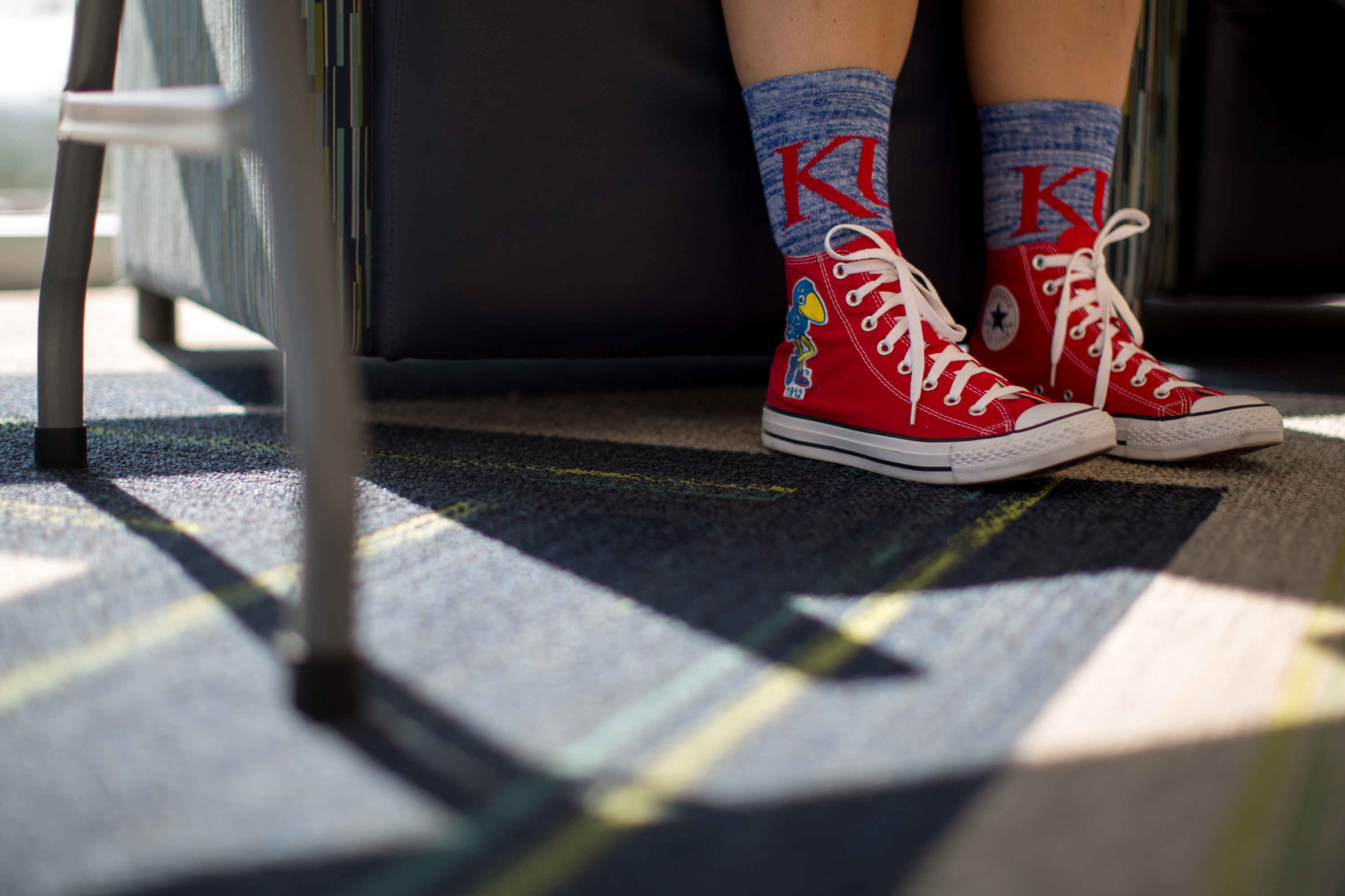 a low view of a student's KU socks and shoes