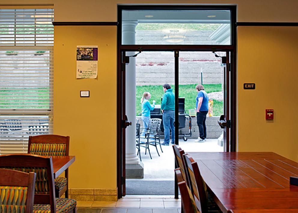 The dining room has an adjoining patio area for barbecues and social events.