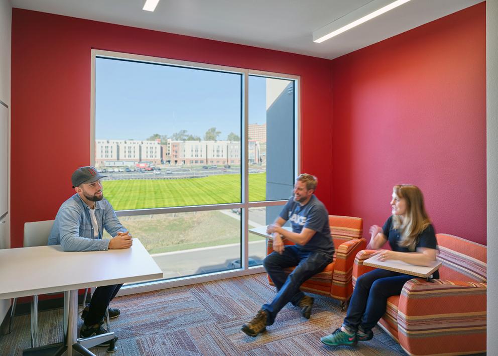 Study lounge with a view of Stouffer Place Apartments to the west