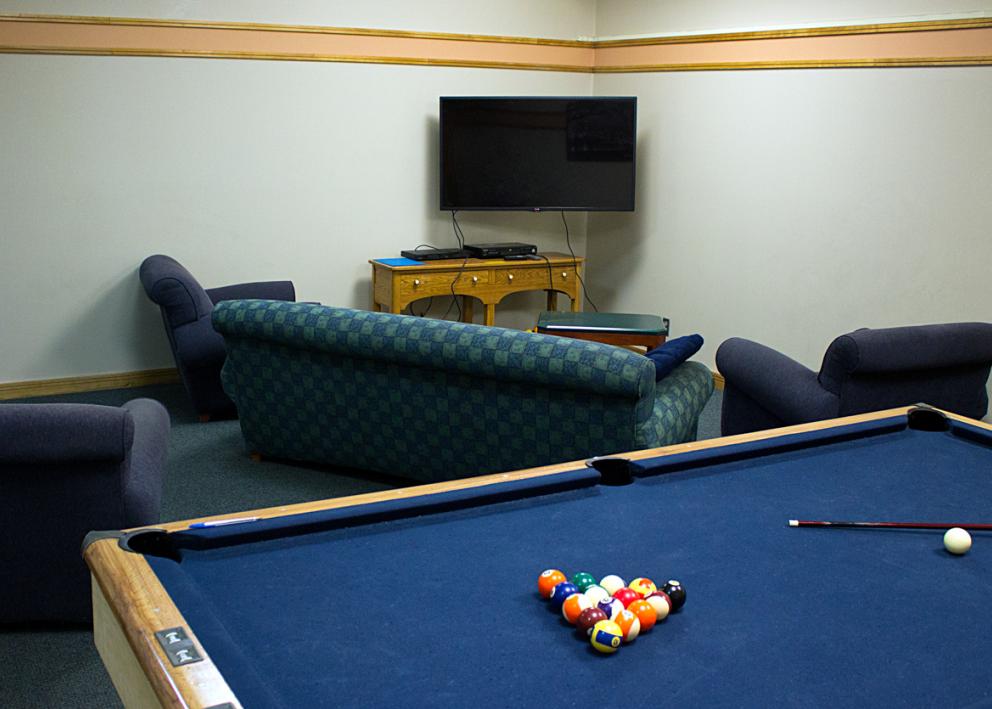 The TV room, complete with pool table.