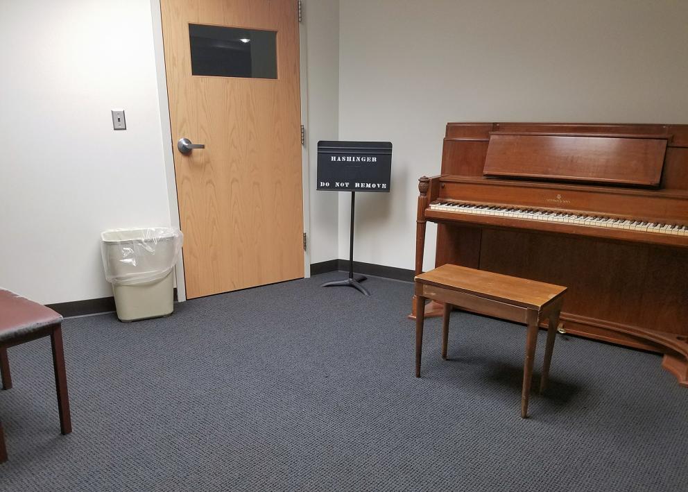 Hashinger Hall small practice room with benches and piano