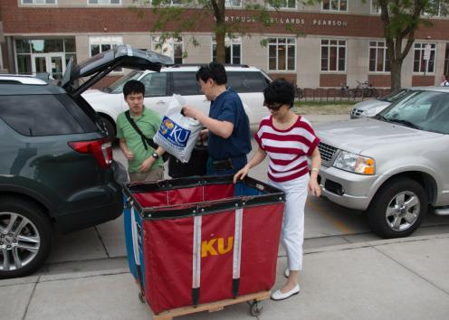 Parents help their student move out