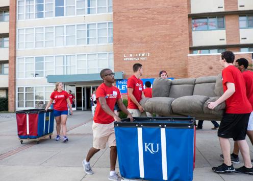   Student volunteers on move-in day at Lewis Hall