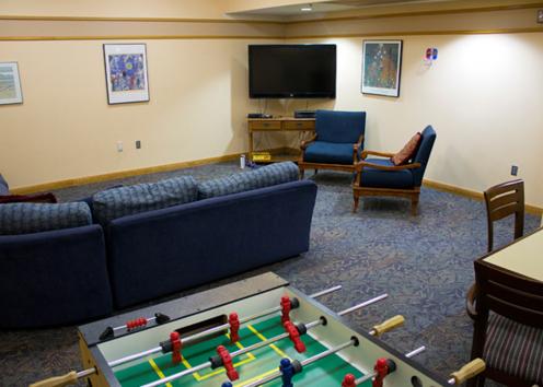The TV room and foosball table at Maggie.