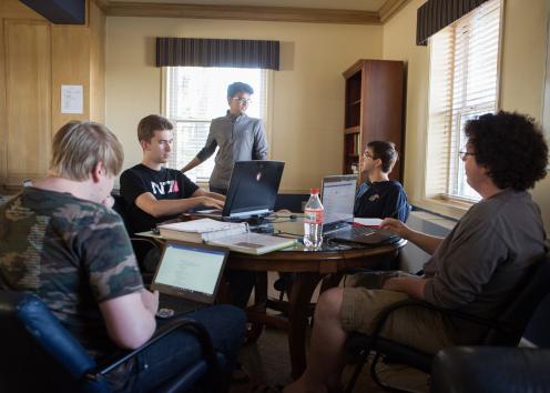 A group of five Battenfeld men studying together