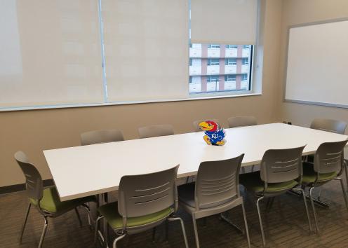 conference room with table and white board