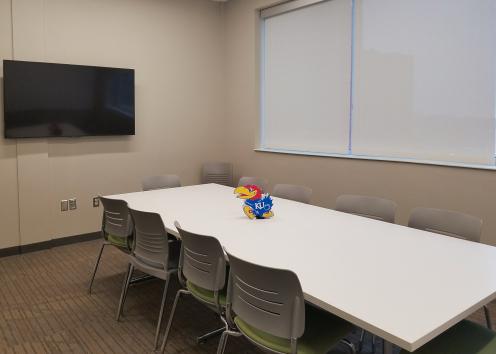 conference room with table and TV