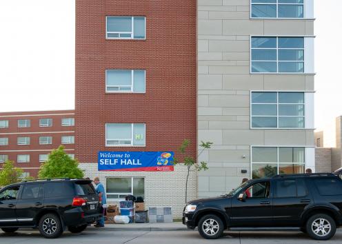cars unloading outside Self Hall on Move-In Day