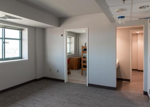 a newly renovated Templin Hall 4-person suite's living room with new carpeting